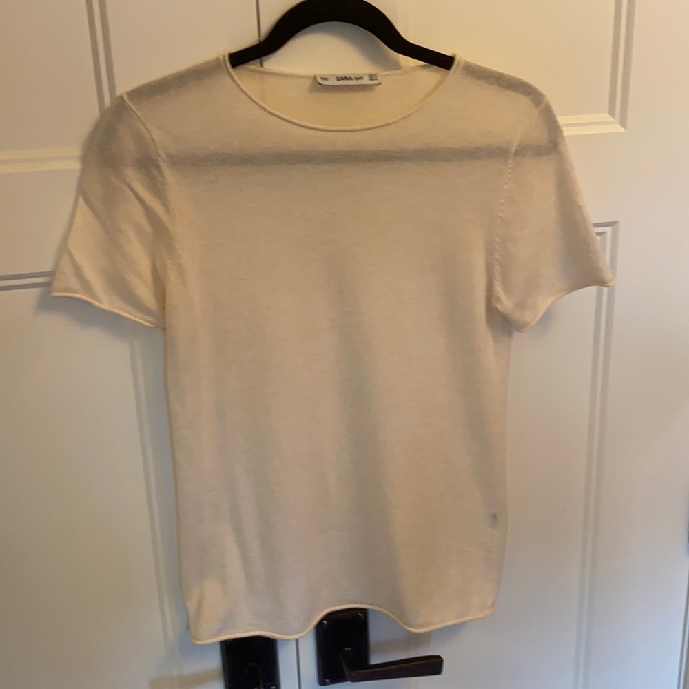 White Zara shirt.